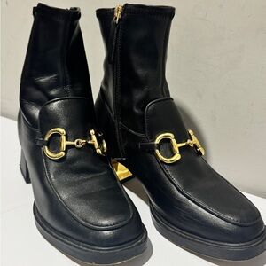Gucci Black Leather Boots with Gold buckle